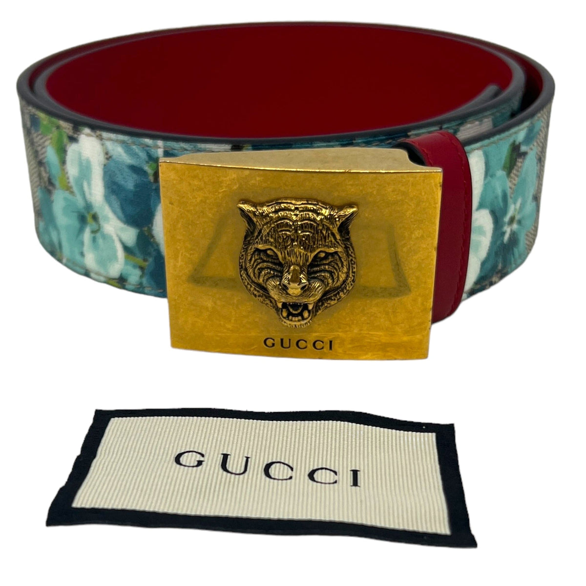 Man with Gucci Belt with Tiger Head and Red and Black Checkered