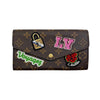 WagnPurr Shop Women's Wallet LOUIS VUITTON Monogram Travel Stickers Sarah Wallet - Brown & Pink